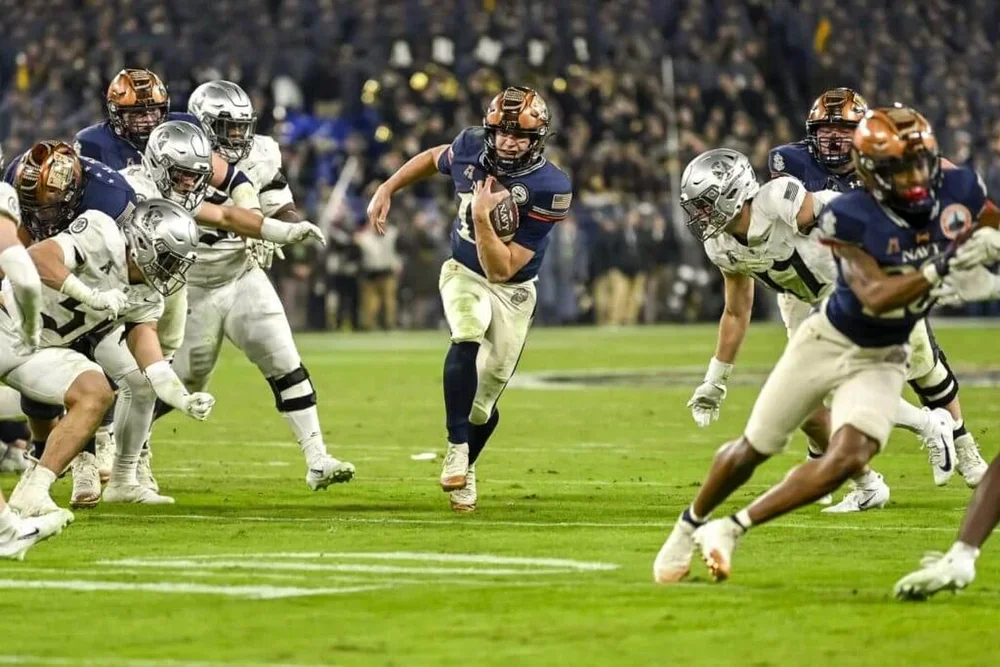Navy Midshipmen quarterback Blake Horvath rushes during the 2025 Army-Navy game.
